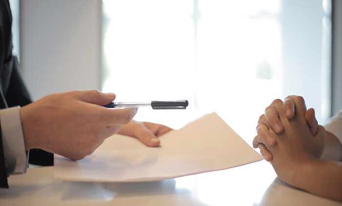 An estate planning attorney discussing wills and trusts with a client